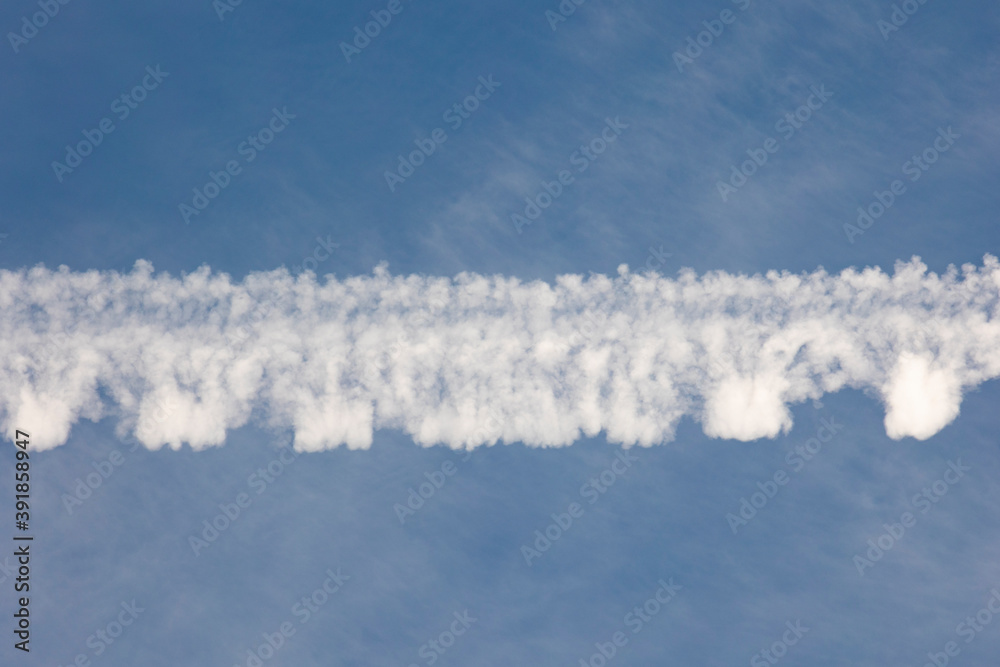 Fototapeta premium white veil clouds in the blue sky