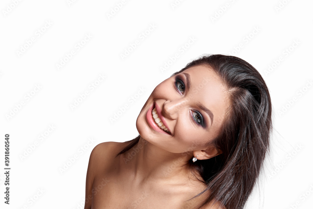 Fototapeta premium Cosmetology. Portrait of beautiful woman with Fresh Skin and smokey eyes make-up