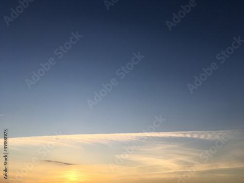 Beautiful sky at sunset with cumulus clouds background