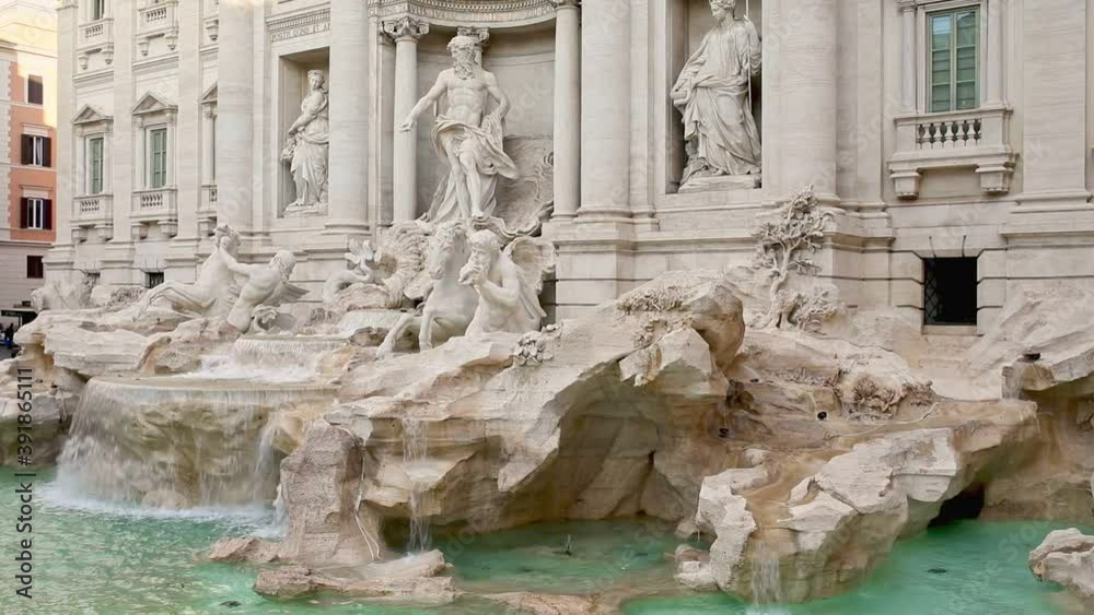 Trevi Fountain in Rome. The Trevi Fountain is the largest Baroque fountain, is one of the most famous landmark in Rome Trevi Fountain in Rome. The Trevi Fountain is the largest Baroque fountain, is one of the most famous landmark in Rome