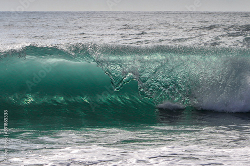 wave breaking on the beach