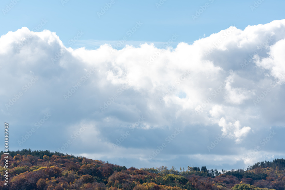 Autumn landscape with couldy moody sky rural mountain woodland bulgaria