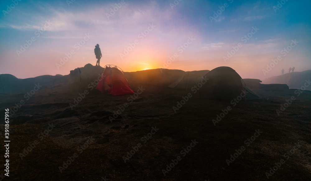 Early morning sunrise on Slieve Binnian in The Mourne mountains, wild camp, County Down, Northern Ireland