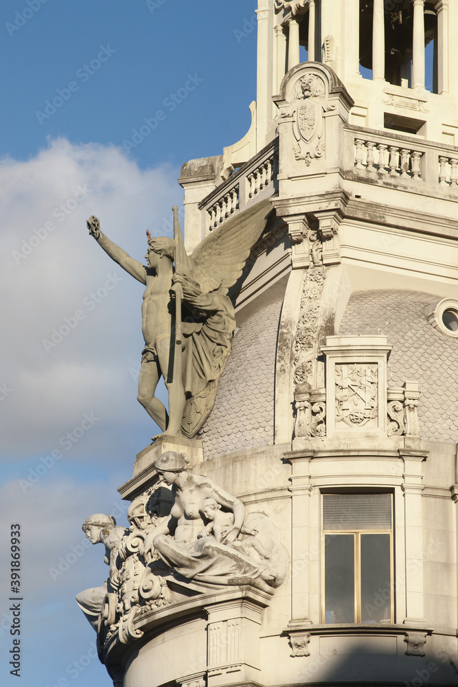 statues on a building on the Liberdade square in Porto, Portugal.