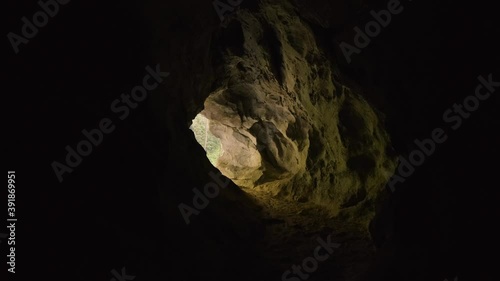 Inside Cave Following Path. Finding Way Out of the Stony/Sandy Cave, Revealing Outside Natural Light. Rakov Škocjan, Slovenia.
