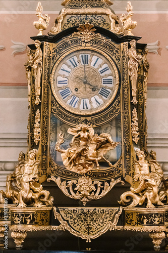 vintage gold clock in the castle