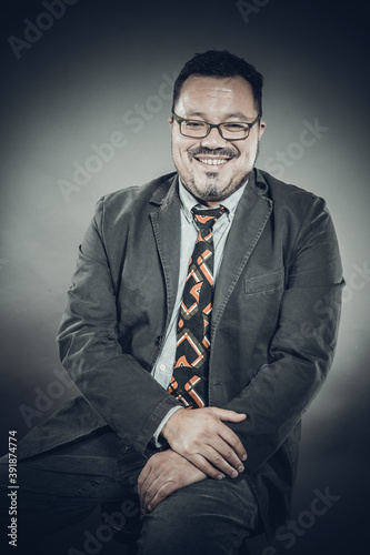 Solid cheerful man in spectacles emotional portrait