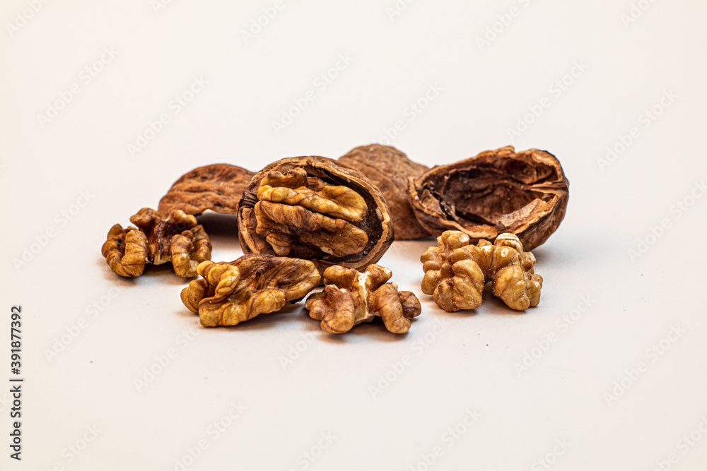 some walnuts against white background some walnuts against white background