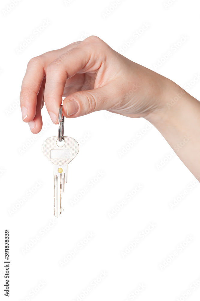 Hand holding door key on white background
Hand holding door key on white background