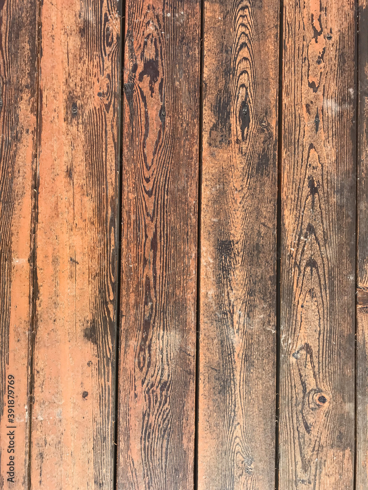 Background of vertical wooden orange planks Background of vertical wooden orange planks