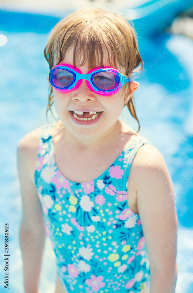 Smiling child with goggles at beach Smiling child with goggles at beach