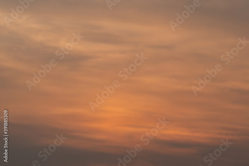 sky background after sunset with beautiful glow of orange hue