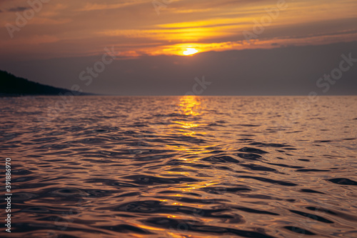 Sunset over Baltic Sea seen from shore in Katy Rybackie  small resort village located on the Vistula Spit in Pomerania region of Poland