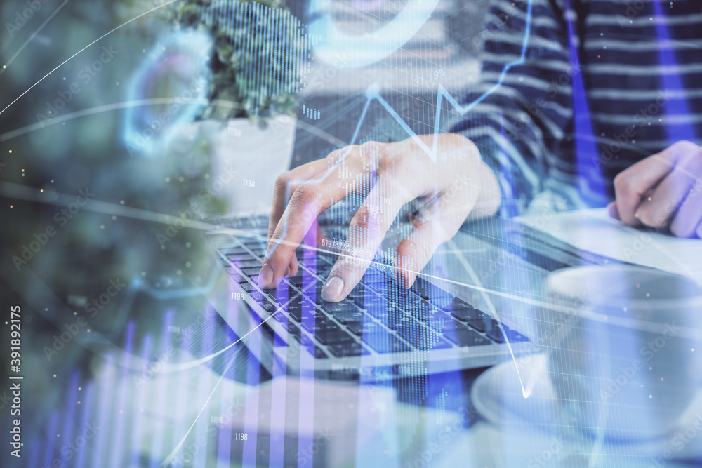 Double exposure of woman hands typing on computer and forex chart hologram drawing. Stock market invest concept.