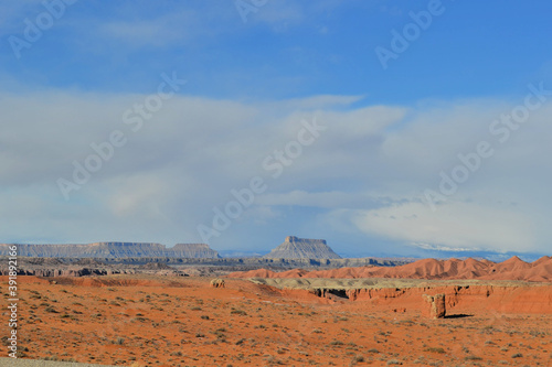 Obraz na płótnie Road through a dessert with blue sky and red ground, Moab, Utah w salonie