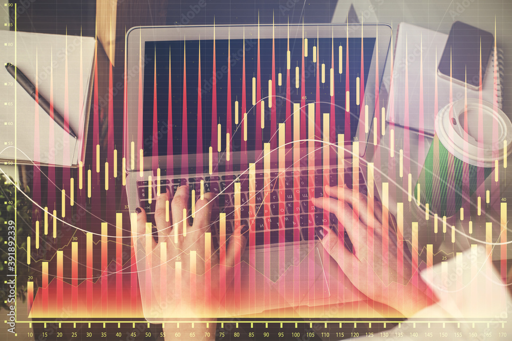 Double exposure of woman hands typing on computer and forex chart hologram drawing. Stock market invest concept. Double exposure of woman hands typing on computer and forex chart hologram drawing. Stock market invest concept.