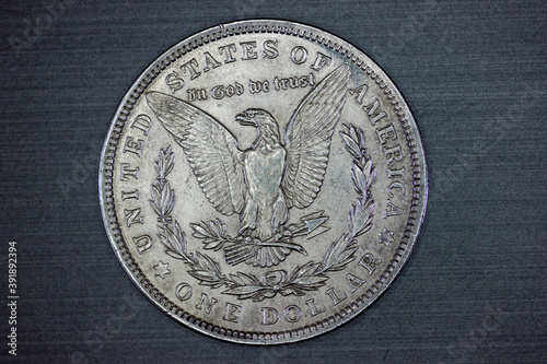 US Morgan silver dollar coin isolated (tails)