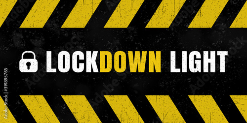 Grungy sign with text „lockdown light“.