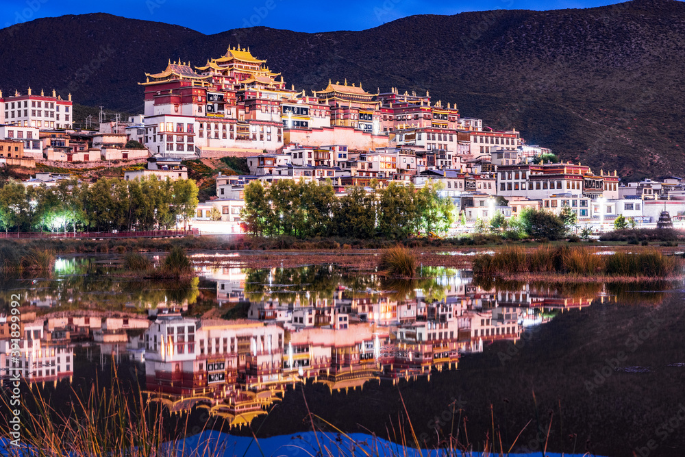 Blues night view of Songzanlin Temple in Shangri-La, Yunnan, China