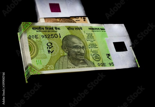 Indian 20rupees currency note bundle topview isolated on white. photo