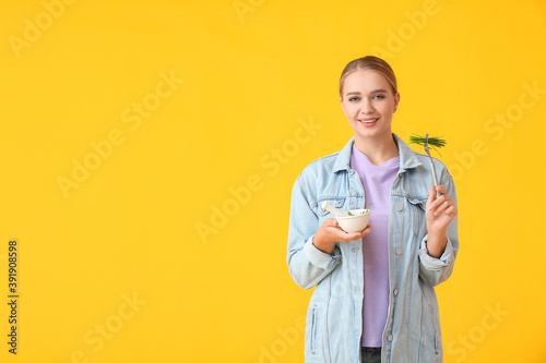 Young woman eating wheatgra...