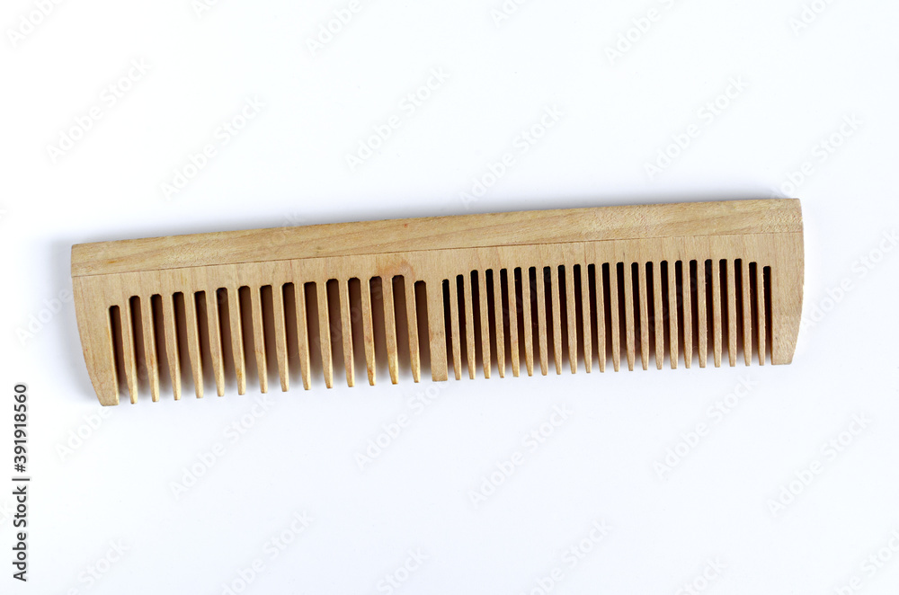 wooden simple hair comb top view close up wooden simple hair comb top view close up