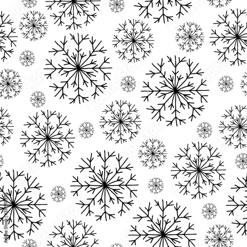 Christmas seamless pattern of drawn snowflakes in doodle style. Vector background for winter packaging.