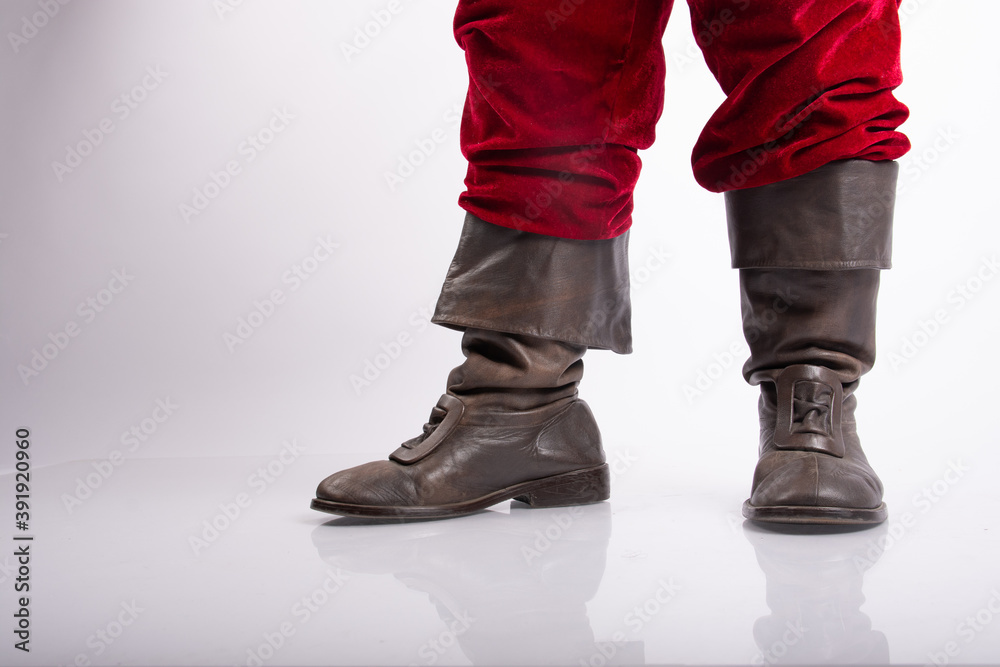 santa´s shoes or boots in white background santa´s shoes or boots in white background