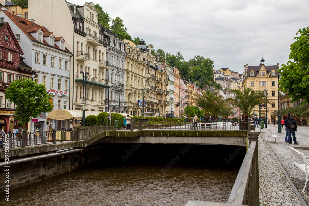 Naklejka premium View of the embankment and the Tepla river in Karlovy Vary in the Czech Republic