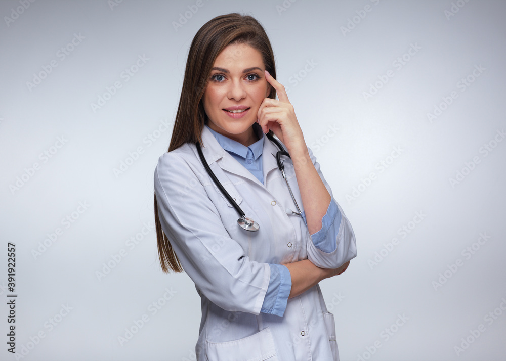 Woman doctor touching her face isolated portrait Woman doctor touching her face isolated portrait