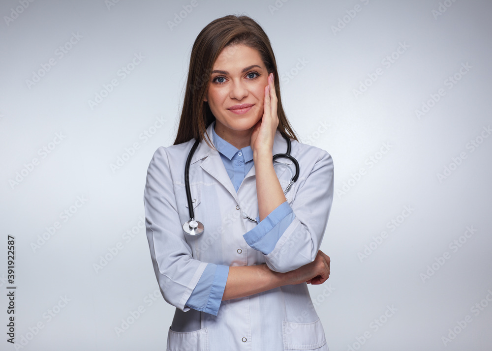 Woman doctor touching her face isolated portrait Woman doctor touching her face isolated portrait