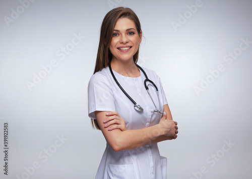 Smiling nurse in white uniform with stethoscope