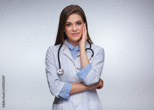 Woman doctor touching her face isolated portrait