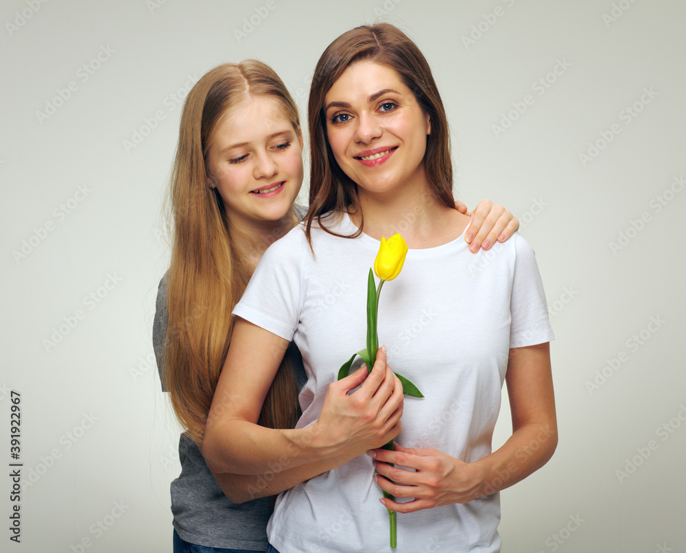 Isolated portrait of young mother and daughter Isolated portrait of young mother and daughter