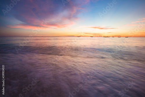 Gorgeous sunset by the sea  beautiful beach scenery