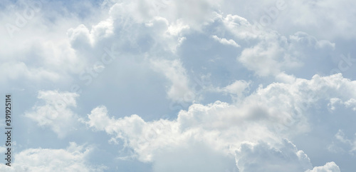 Beautiful sky with white clouds pattern background. Sky and clouds in daylight. Natural abstract background.