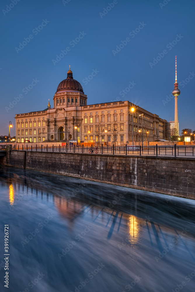 The reconstructed Berlin Palace with the Television Tower at night