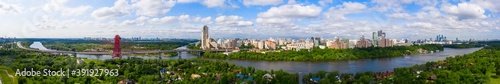 Panoramic view of Moscow on a sunny day  Russia. Picturesque region in the north-west of Moscow city. Zhivopisny bridge across the Moscow river.
