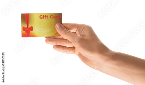 Woman holding gift card on white background, closeup