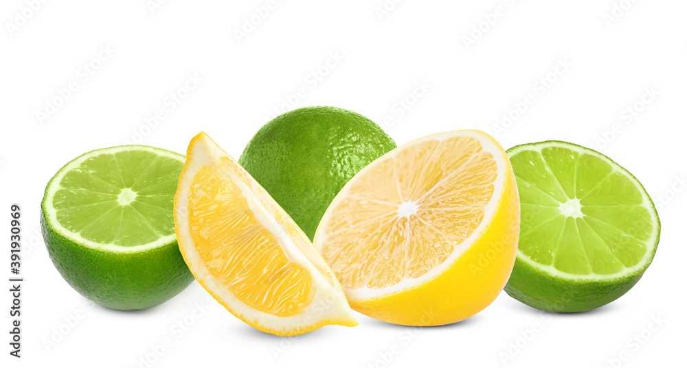 Fresh ripe limes and lemons on white background