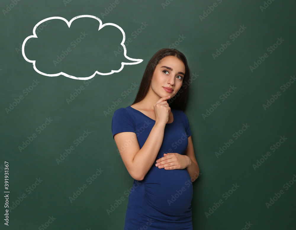 Emotional pregnant woman choosing name for her child. Future mother near green chalkboard with empty thought cloud