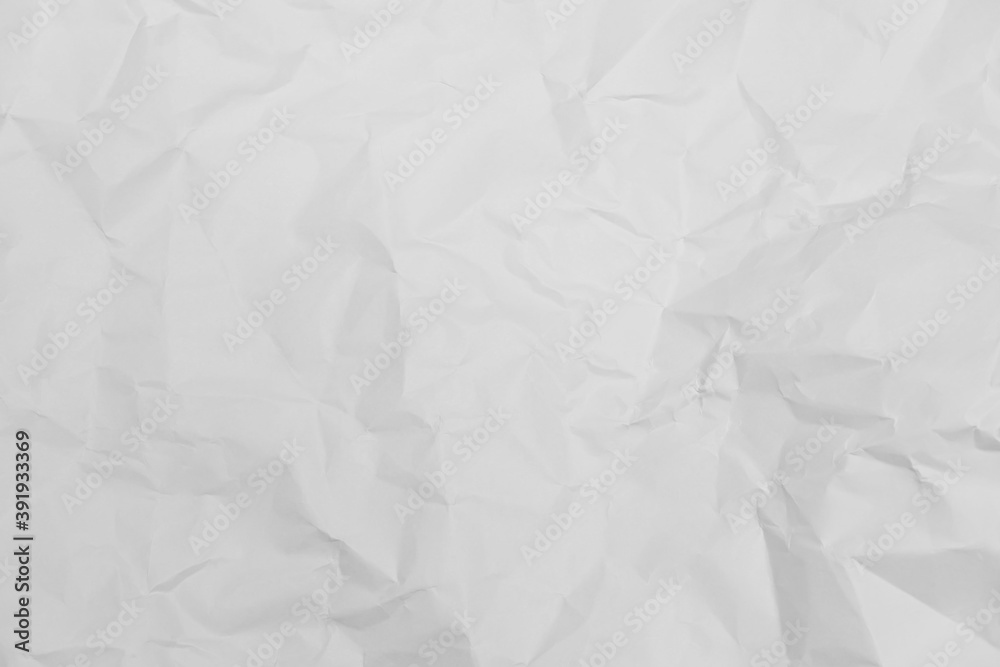 Fototapeta premium White crumpled paper texture background.