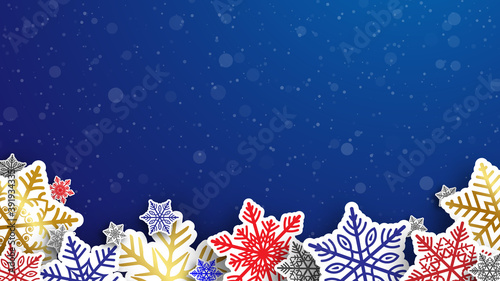 Abstract blue background with multicolored snowflakes in papercut style . Christmas and new year wallpaper .