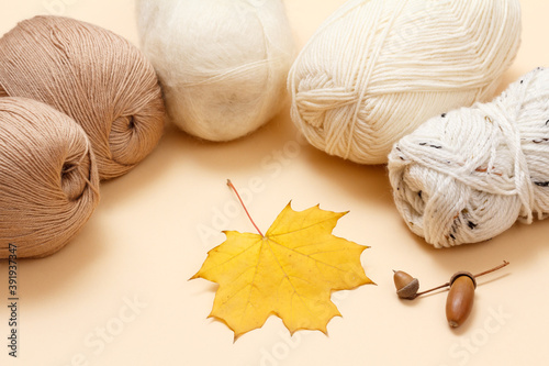 Woolen yarn for knitting. Balls of natural wool yarn.
