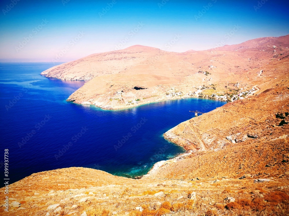 panorama with desert mountains and blue ocean on the old mining island of Serifos, Greece