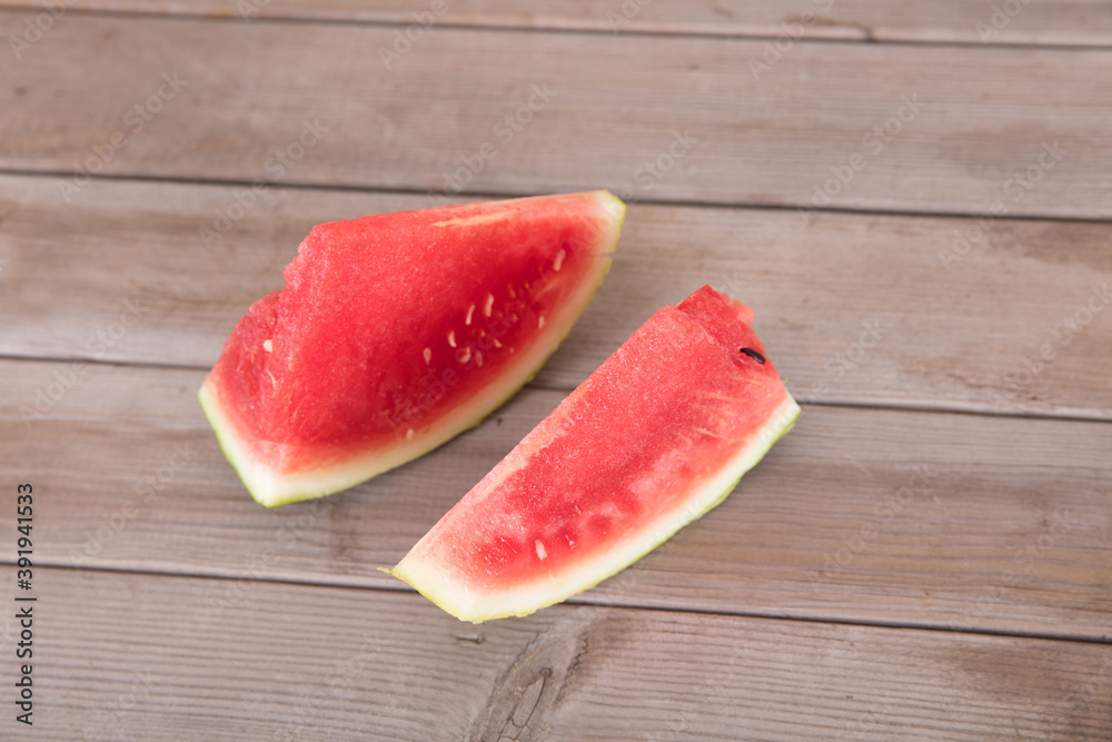 Two sliced watermelons on the summer table Two sliced watermelons on the summer table