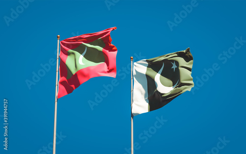 Beautiful national state flags of Maldives and Pakistan.