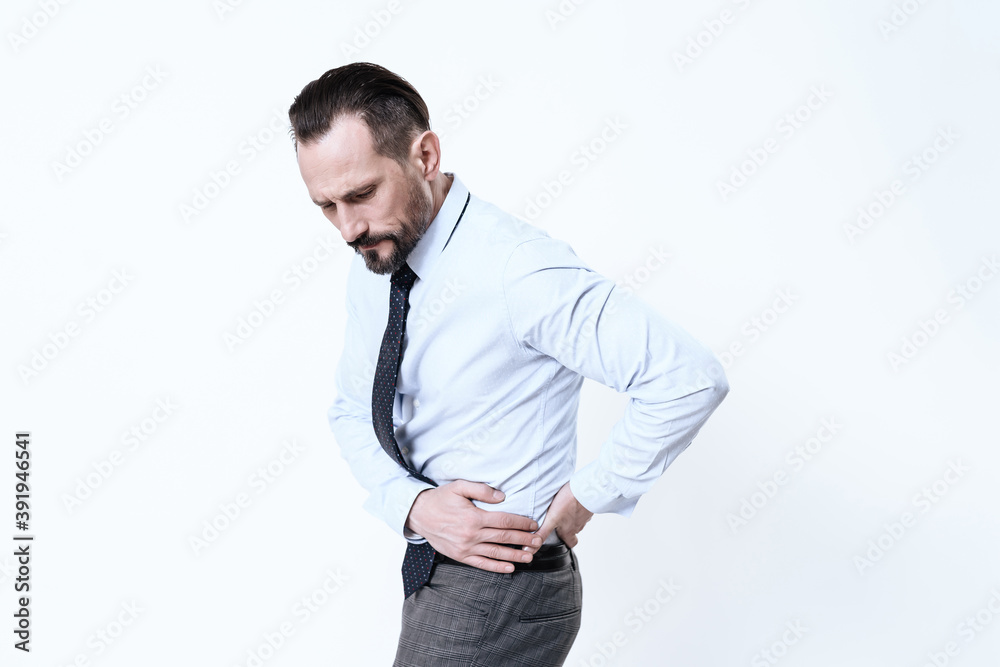 Man hold on to his side and feels severe pain. Man hold on to his side and feels severe pain.