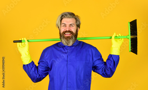 man cleaner. bearded man cleaning with mop. Janitor in gloves. husband cleaning house. Housework and domestic duty. Male janitor with cleaning supply. sweeping the floor