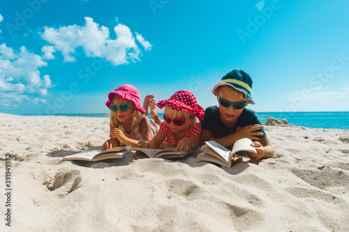 Sticker boy and girls read books on beach, family vacation